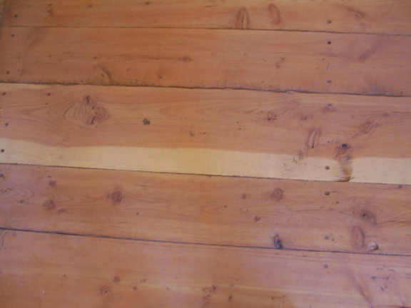 Douglas-Fir floor with clear caulking in cracks hand made by greenleaf craftsmen